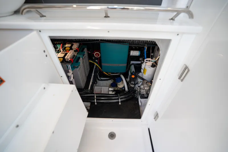  Yacht Photos Pics 2024 Blackfin 400CC boat compartment showcasing electrical and mechanical components.