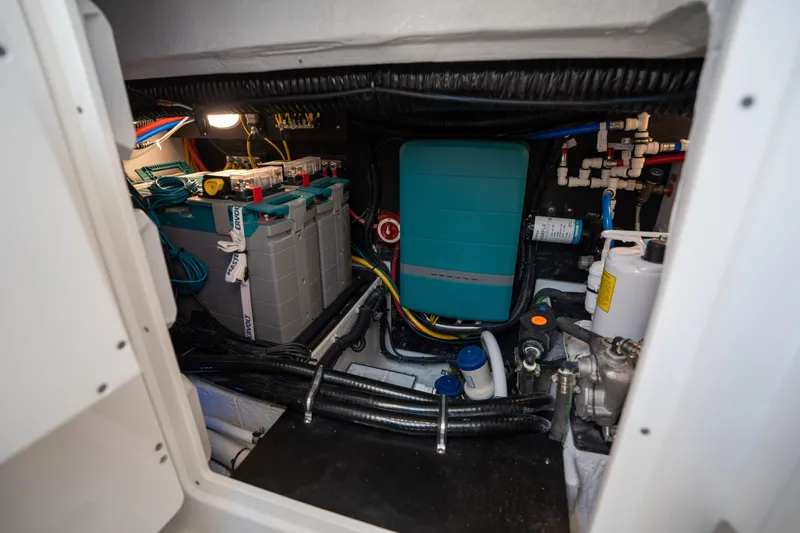  Yacht Photos Pics Engine compartment of 2024 Blackfin 400CC boat with batteries and wiring.