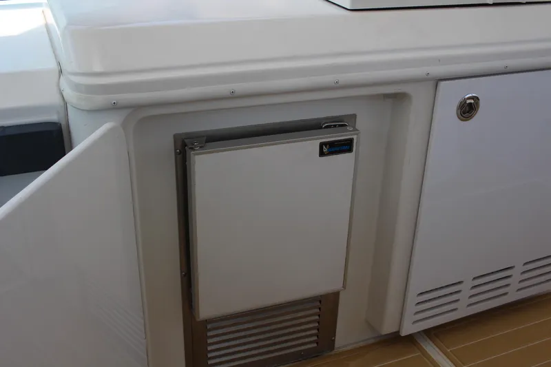 Social Distancing Yacht Photos Pics Built-in refrigerator on the 2006 Carver 560 Voyager yacht.