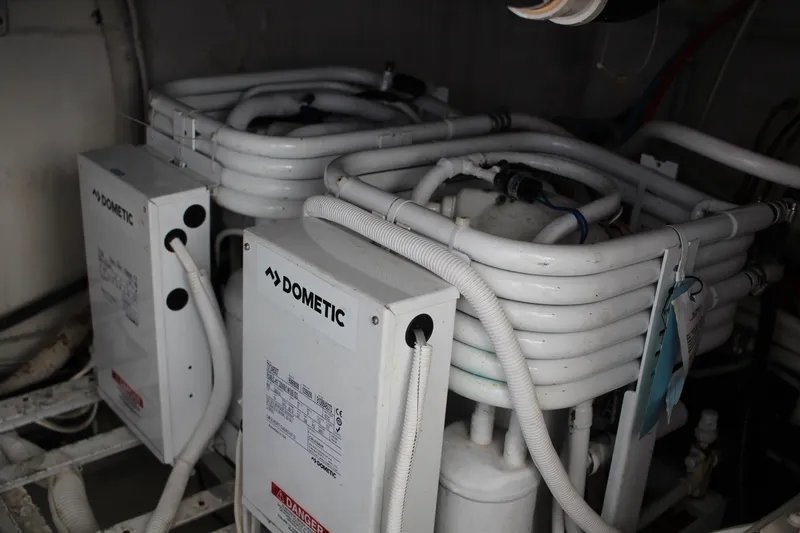 Social Distancing Yacht Photos Pics Dometic air conditioning units in 2006 Carver 560 Voyager yacht engine room.