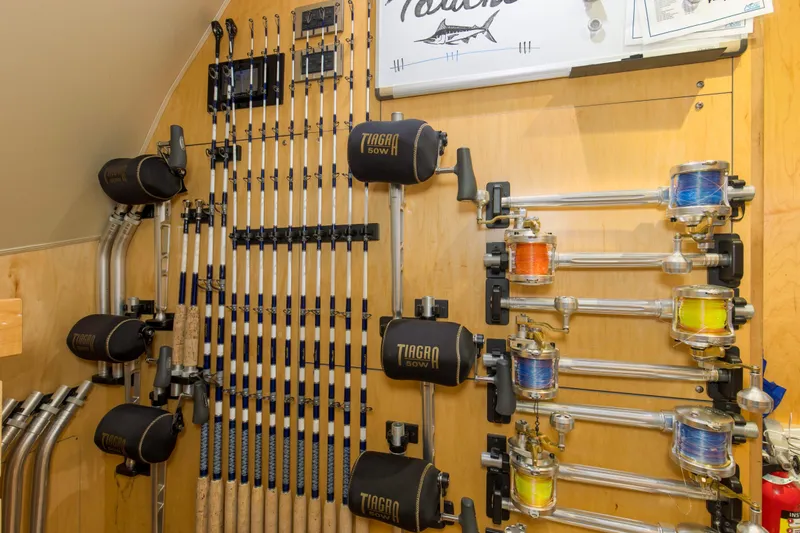 Touche Yacht Photos Pics Fishing rods and reels storage on a 2016 Viking 92 Enclosed Bridge yacht.