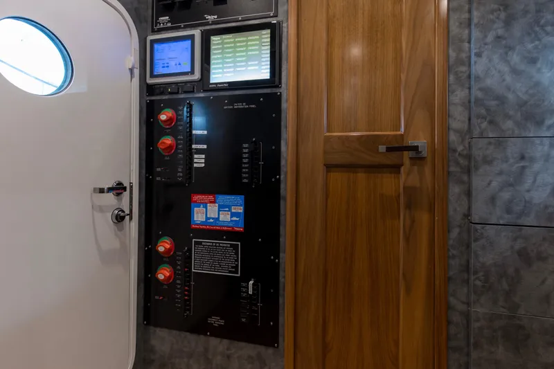 Touche Yacht Photos Pics Control panel and door inside 2016 Viking 92 Enclosed Bridge yacht.