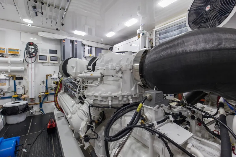 Touche Yacht Photos Pics Engine room of 2016 Viking 92 Enclosed Bridge yacht, featuring advanced machinery and equipment.
