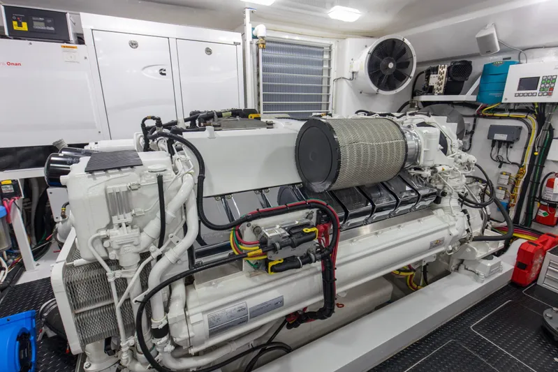 Touche Yacht Photos Pics Engine room of 2016 Viking 92 Enclosed Bridge yacht, featuring advanced machinery and equipment.