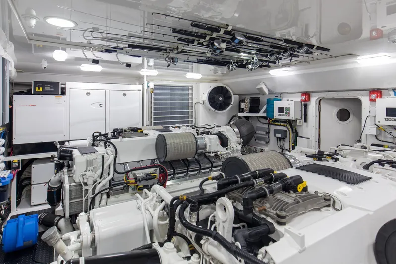 Touche Yacht Photos Pics Engine room of 2016 Viking 92 Enclosed Bridge yacht, featuring advanced machinery and equipment.