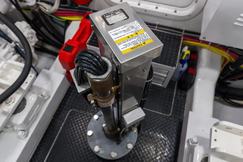 Touche Yacht Photos Pics Engine room of 2016 Viking 92 Enclosed Bridge yacht, featuring mechanical components.