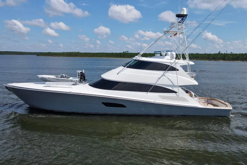 Touche Yacht Photos Pics 2016 Viking 92 Enclosed Bridge yacht cruising on a calm, scenic waterway.