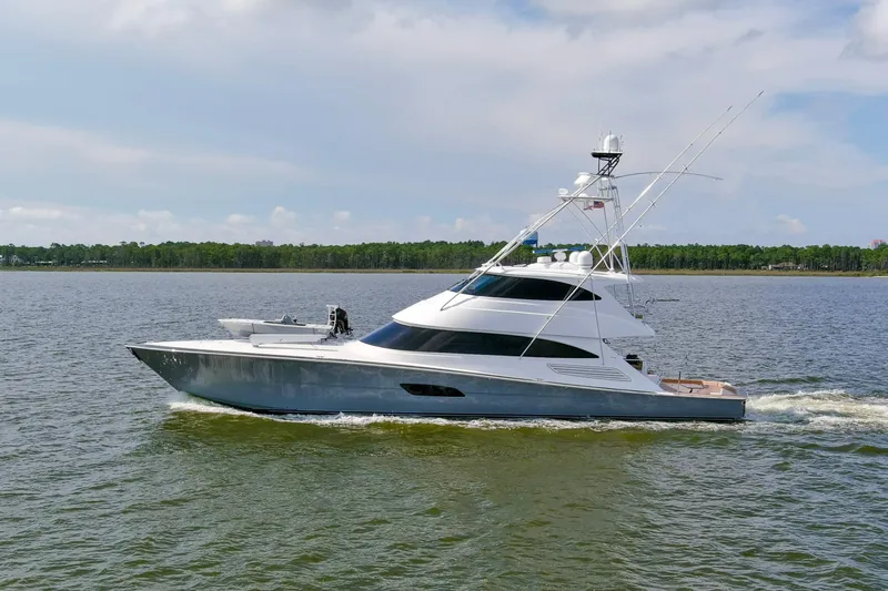 Touche Yacht Photos Pics 2016 Viking 92 Enclosed Bridge yacht cruising on a calm lake.