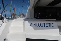 Leopard 45 catamaran named "La Filouterie" docked at a marina, 2020 model.