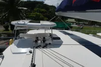 2020 Leopard 45 catamaran deck with rigging and tropical background.