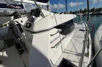 2020 Leopard 45 catamaran docked, featuring sleek design and modern navigation equipment.