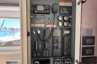 Electrical control panel on a 2020 Leopard 45 yacht, featuring various switches and gauges.