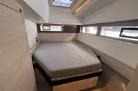 Luxurious cabin interior of 2020 Leopard 45 yacht with modern design and ample natural light.