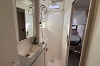 Modern bathroom interior on a 2020 Leopard 45 yacht, featuring sleek design and compact layout.