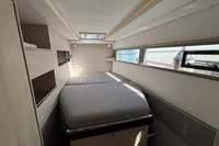 Interior cabin of a 2020 Leopard 45 yacht with modern design and natural light.