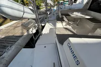 Deck view of a 2020 Leopard 45 catamaran with seating and a table.
