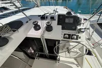 Helm station of a 2020 Leopard 45 catamaran with navigation equipment and winches.