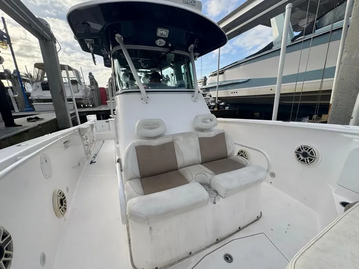  Yacht Photos Pics 2011 Everglades 320 Center Console boat interior with seating and console view.