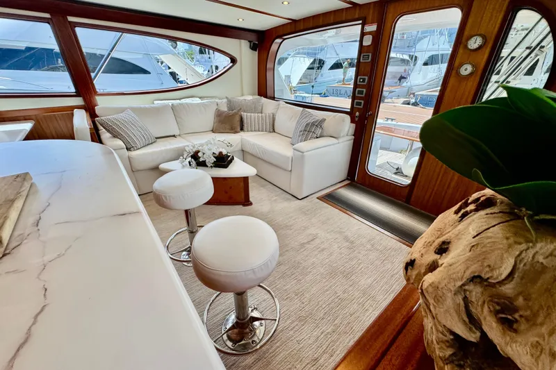  Yacht Photos Pics Luxurious interior of 2013 Hatteras GT60 yacht with elegant seating and modern decor.