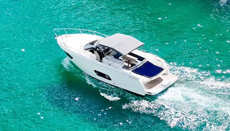  Yacht Photos Pics Luxurious 2014 Absolute 40 yacht cruising on clear turquoise waters.