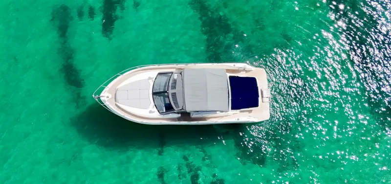  Yacht Photos Pics Aerial view of 2014 Absolute 40 yacht on clear turquoise water.