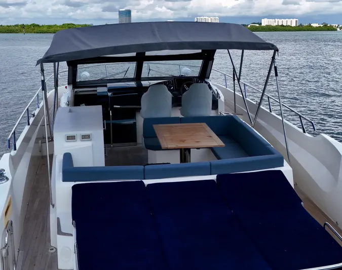  Yacht Photos Pics Luxury Absolute 40 yacht, 2014 model, featuring spacious deck and seating area on calm waters.