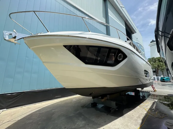  Yacht Photos Pics 2014 Absolute 40 yacht docked in a marina, showcasing sleek design and modern features.