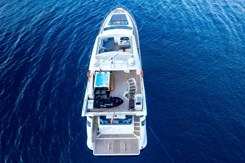 Hubo Yacht Photos Pics Aerial view of 2016 Azimut 84 yacht on blue ocean water.