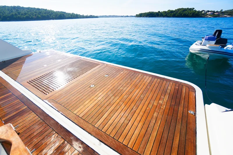 Hubo Yacht Photos Pics Luxurious 2016 Azimut 84 yacht deck with scenic ocean view and tender boat.