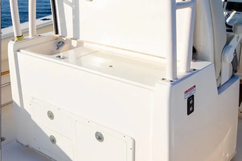  Yacht Photos Pics 2018 Cobia 320 Center Console boat interior with storage compartments.