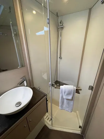 Genesis Yacht Photos Pics Modern bathroom in 2021 Jeanneau 54 yacht with shower and sink.