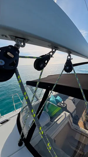 Genesis Yacht Photos Pics 2021 Jeanneau 54 sailboat deck with rigging and ocean view.