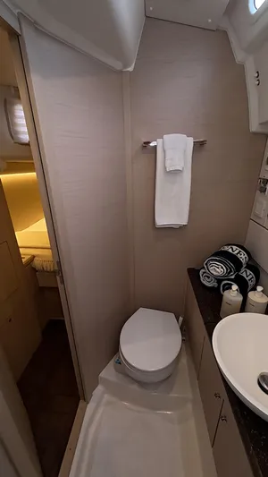 Genesis Yacht Photos Pics 2021 Jeanneau 54 yacht bathroom with modern fixtures and elegant design.