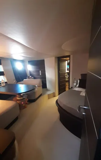  Yacht Photos Pics Luxurious interior of a 2004 Azimut 68S yacht, featuring elegant furnishings and modern design.