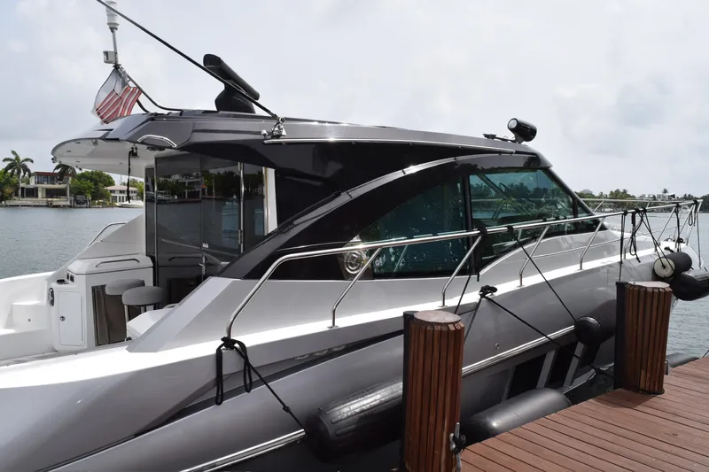 Insieme Yacht Photos Pics 2018 Cruisers Yachts 45 Cantius docked, showcasing sleek design and modern features.