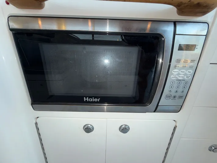 Ticklish Yacht Photos Pics Haier microwave in True North 38 Heritage boat, year 2002.