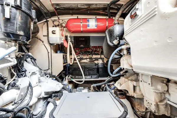 No Pods - V-drive Yacht Photos Pics Engine room of 2015 Sea Ray 510 Fly yacht, showcasing mechanical components and systems.