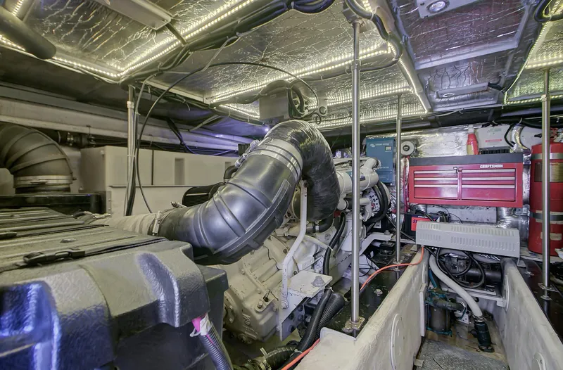 No Surrender Yacht Photos Pics Engine room of 2000 Carver 530 Voyager Pilothouse with visible machinery and equipment.