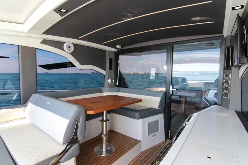  Yacht Photos Pics Luxurious interior of 2021 Galeon 425 HTS yacht with ocean view and modern seating.