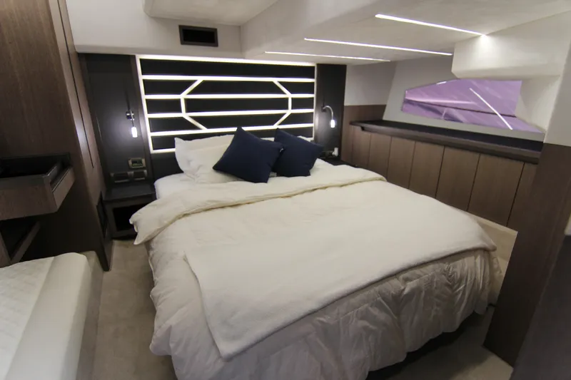  Yacht Photos Pics Luxurious bedroom interior of 2021 Galeon 425 HTS yacht with modern design elements.