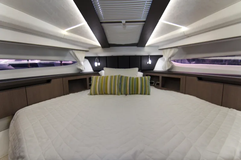  Yacht Photos Pics Luxurious interior of 2021 Galeon 425 HTS yacht with cozy bed and modern design.