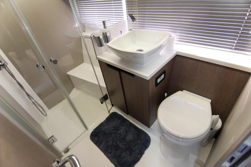 Yacht Photos Pics Modern bathroom in 2021 Galeon 425 HTS yacht with shower, sink, and toilet.