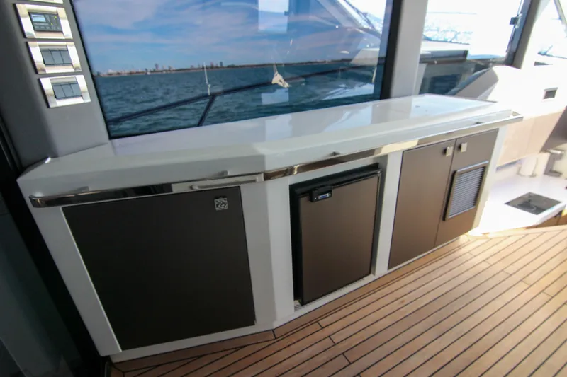  Yacht Photos Pics Galeon 425 HTS 2021 yacht interior with sleek cabinetry and ocean view.