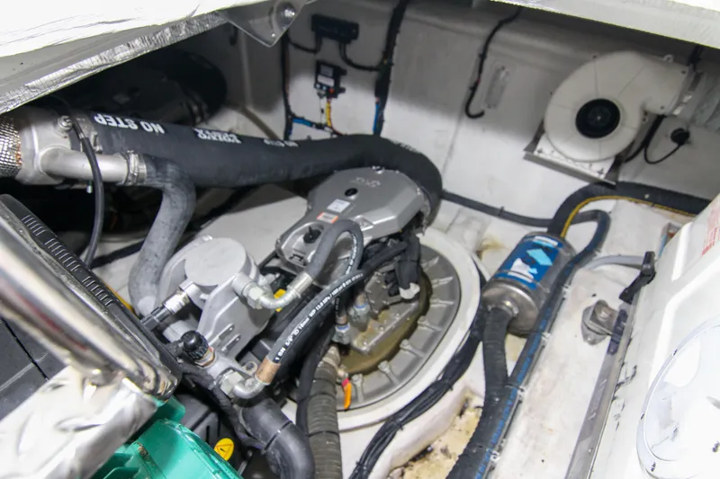  Yacht Photos Pics Engine room of 2021 Galeon 425 HTS yacht, showcasing mechanical components and hoses.