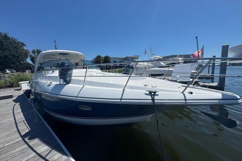  Yacht Photos Pics 2008 Cruisers 420 yacht docked at marina under clear blue sky.