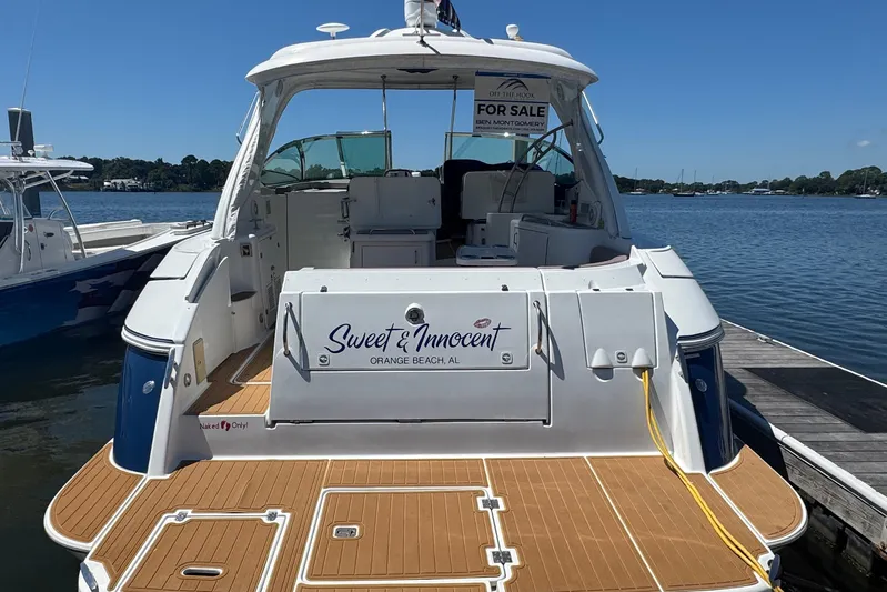  Yacht Photos Pics 2008 Cruisers 420 yacht for sale, docked at marina, "Sweet & Innocent" nameplate visible.