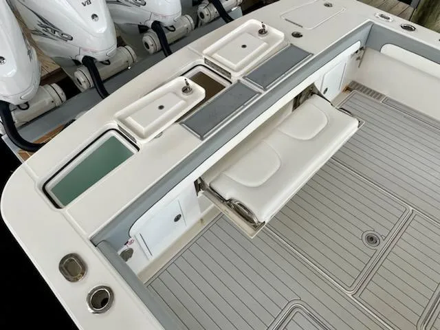  Yacht Photos Pics 2020 Regulator 41 boat deck with seating and storage compartments.