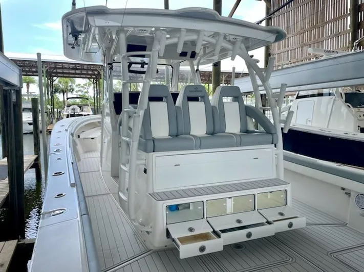  Yacht Photos Pics 2020 Regulator 41 boat with seating and storage compartments.