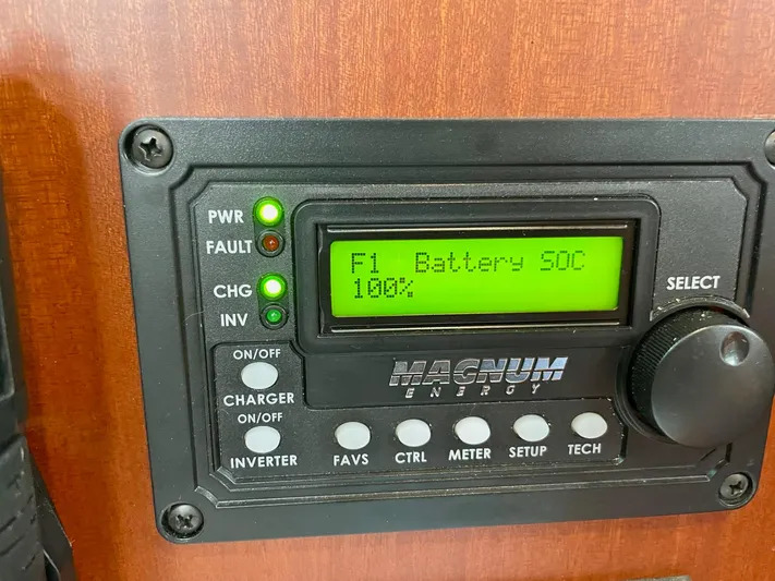 Oasis Yacht Photos Pics Battery monitor display on 2004 Beneteau Oceanis 393 showing 100% charge.