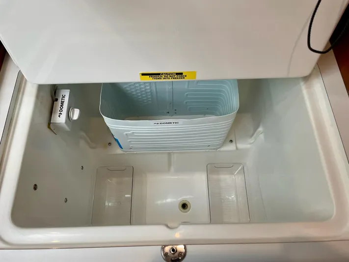 Oasis Yacht Photos Pics Open storage compartment in a 2004 Beneteau Oceanis 393 sailboat.